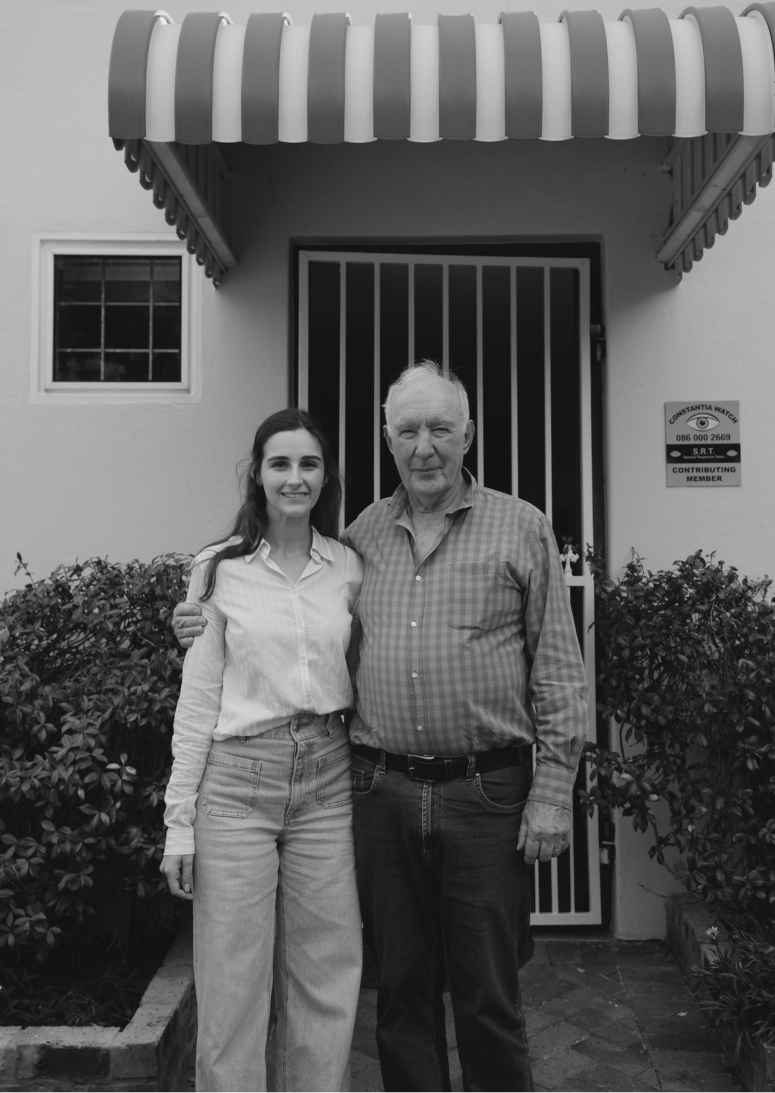 Dr Stephanie Aron standing with Dr Murray Solomon outside The Village GP practice in Constantia